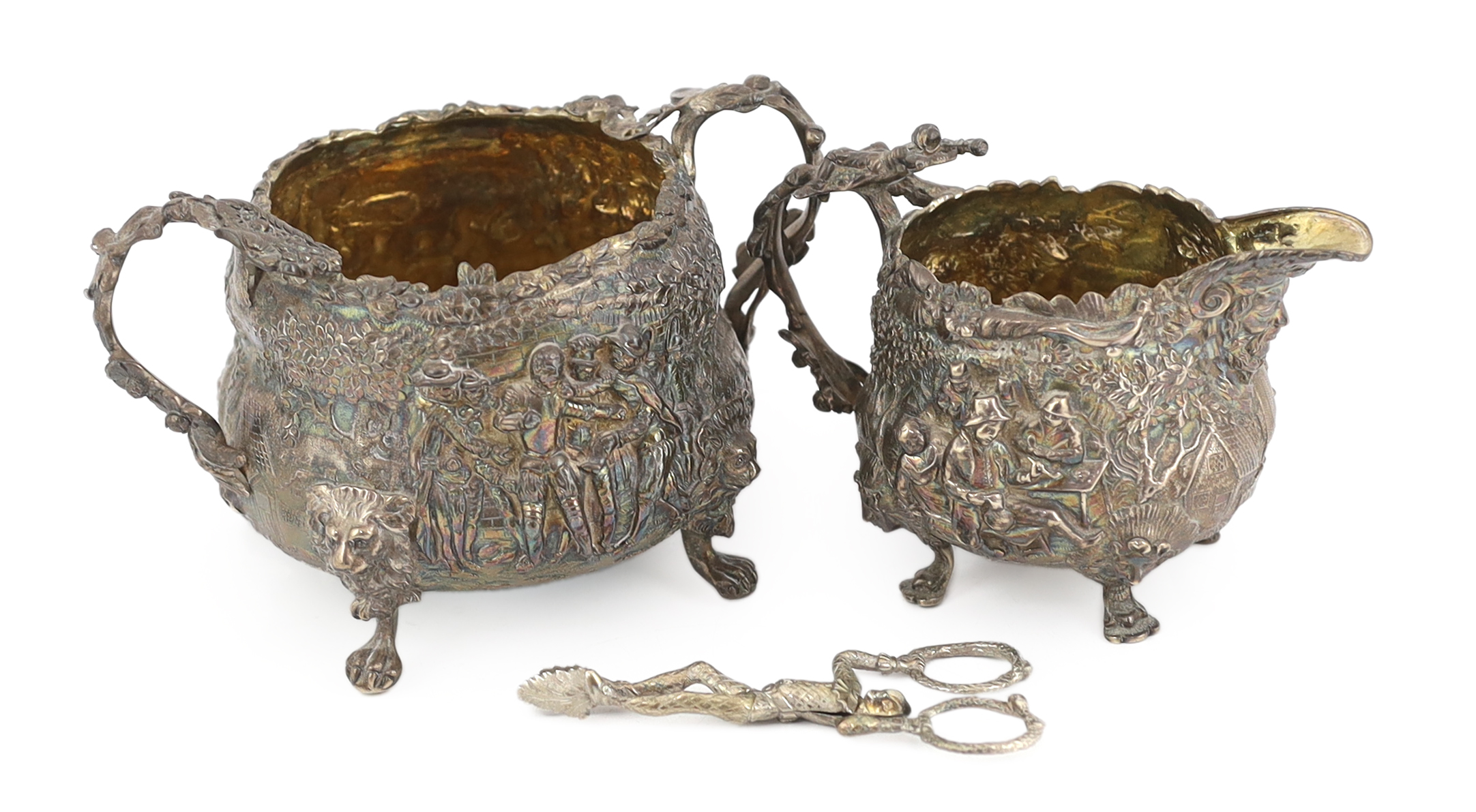 A George IV embossed silver sugar bowl and cream jug by Edward Farrell